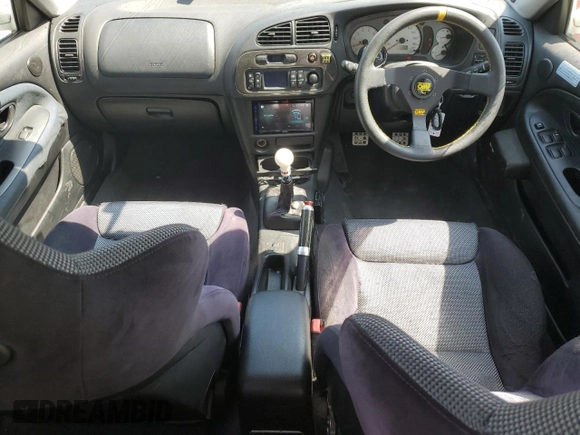 1998 Mitsubishi Lancer z VIN 000000CP9A0001997, wystawiony jako Copart lot #68862654 z przebiegiem 164 292 mil mil oraz Szkoda całkowita • Salvage title. Historia ofert i sprzedaży dostępna na DreamBid. Obrazek 8.