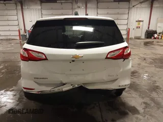 2018 Chevrolet Equinox LT with VIN 2GNAXSEV1J6129252, listed as a IAAI auction lot 41676676 with 112,909 mi miles and . Bid and sale history available at carsss.com. Image 16.