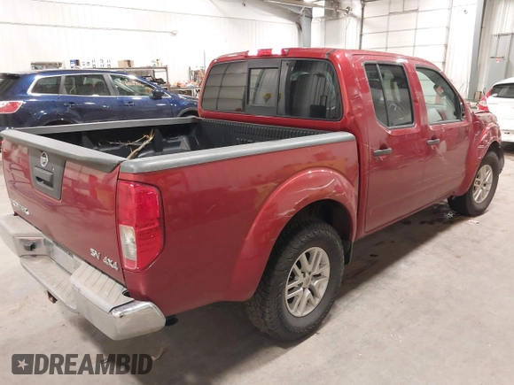 2014 Nissan Frontier S with VIN 1N6AD0EV6EN708600, listed as a IAAI auction lot 42296112 with 112,737 mi miles and . Bid and sale history available at DreamBid. Image 4.