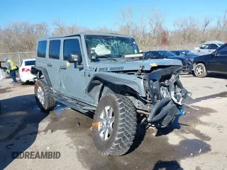 2015 Jeep Wrangler Unlimited Sahara with VIN 1C4BJWEG7FL712057, listed as a IAAI auction lot 41748306 with 95,777 mi miles and . Bid and sale history available at DreamBid. Image 1.