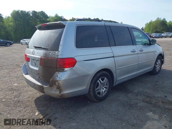 2010 Honda Odyssey EX-L with VIN 5FNRL3H78AB034756, listed as a IAAI auction lot 41979532 with 167,791 mi miles and . Bid and sale history available at DreamBid. Image 4.