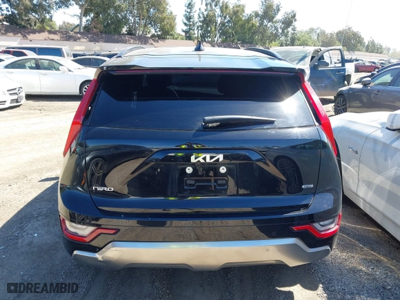 2023 Kia Niro SX Touring with VIN KNDCT3LE6P5038102, listed as a IAAI auction lot 41710555 with 57,669 mi miles. Bid and sale history available at carsss.com. Image 16.