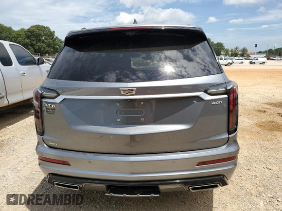 2020 Cadillac XT6 AWD Sport with VIN 1GYKPGRS7LZ134130, listed as a Copart auction lot 59216574 with 75,622 mi miles and Salvage Title. Bid and sale history available at carsss.com. Image 6.