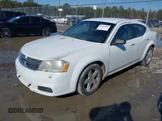 2013 Dodge Avenger SE with VIN 1C3CDZAB3DN708262, listed as a IAAI auction lot 41445183 with 189,571 mi miles and . Bid and sale history available at carsss.com. Image 2.