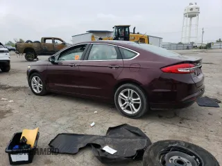 2018 Ford Fusion SE z VIN 3FA6P0HD2JR185298, wystawiony jako Copart lot #58898075 z przebiegiem Nie podano mil oraz Czysty tytuł • Clean title. Historia ofert i sprzedaży dostępna na DreamBid. Obrazek 2.
