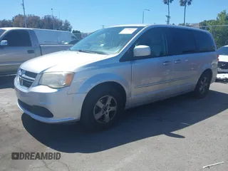 2012 Dodge Grand Caravan SXT with VIN 2C4RDGCG7CR204835, listed as a IAAI auction lot 41948688 with 125,466 mi miles and . Bid and sale history available at DreamBid. Image 17.
