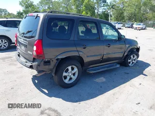 2006 Mazda Tribute i with VIN 4F2YZ02Z36KM29148, listed as a IAAI auction lot 42044163 with 175,786 mi miles and . Bid and sale history available at carsss.com. Image 4.