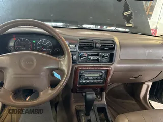 2002 Isuzu Rodeo S with VIN 4S2CK58W124336947, listed as a Copart auction lot 63482935 with 248,008 mi miles and Clean title. Bid and sale history available at DreamBid. Image 9.