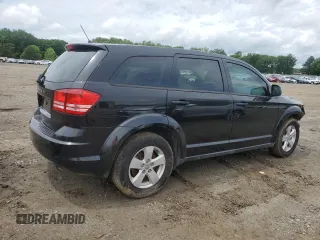 2013 Dodge Journey American Value with VIN 3C4PDCAB3DT566912, listed as a Copart auction lot 55327105 with 161,293 mi miles and Salvage title. Bid and sale history available at DreamBid. Image 3.