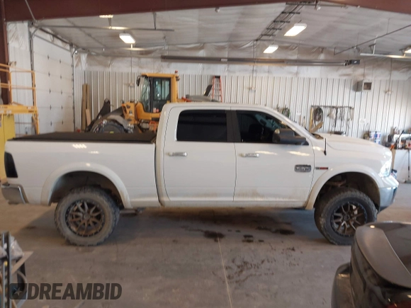 2015 Ram 1500 Laramie Limited with VIN 1C6RR7WM6FS678840, listed as a IAAI auction lot 42040449 with Not provided miles and . Bid and sale history available at DreamBid. Image 13.