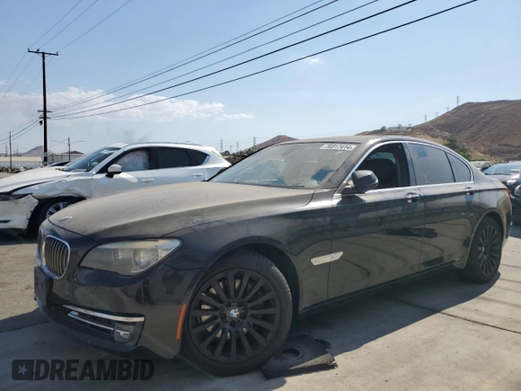 2013 BMW 7 Series 740i with VIN WBAYA6C52DC995036, listed as a Copart auction lot 70317414 with 126,246 mi miles and Clean Title. Bid and sale history available at carsss.com. Image 1.