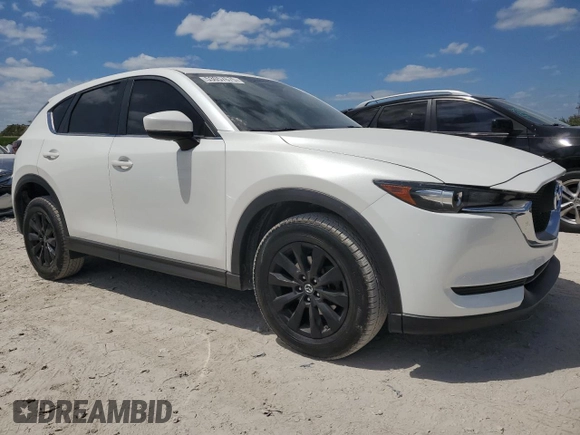2018 Mazda CX-5 Sport with VIN JM3KFBBM2J0330444, listed as a Copart auction lot 53057675 with 121,747 mi miles and Clean Title. Bid and sale history available at carsss.com. Image 4.