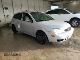 2007 Ford Focus S with VIN 1FAFP31N47W129857, listed as a Copart auction lot 51449645 with 146,360 mi miles and Salvage Title. Bid and sale history available at DreamBid. Image 4.