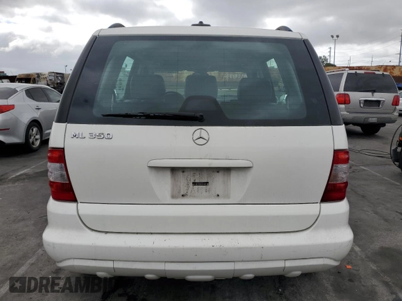 2004 Mercedes-Benz M-Class 3.5L with VIN 4JGAB57E74A501184, listed as a Copart auction lot 77801184 with 0 mi miles and Salvage Title. Bid and sale history available at carsss.com. Image 6.