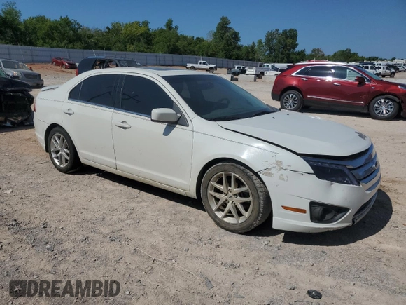 2012 Ford Fusion SEL z VIN 3FAHP0JA3CR336743, wystawiony jako Copart lot #45455065 z przebiegiem 126 456 mil mil oraz Szkody całkowita. Historia ofert i sprzedaży dostępna na DreamBid. Obrazek 4.