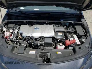 2021 Toyota Prius LE z VIN JTDKAMFPXM3190346, wystawiony jako Copart lot #57626675 z przebiegiem 102 786 mil mil oraz Szkoda całkowita • Salvage title. Historia ofert i sprzedaży dostępna na DreamBid. Obrazek 11.