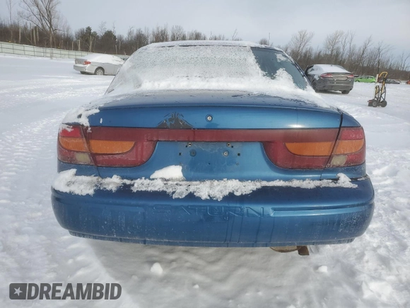 2000 Saturn SL with VIN 1G8ZK5272YZ260216, listed as a Copart auction lot 42425035 with Not provided miles and Salvage title. Bid and sale history available at DreamBid. Image 6.