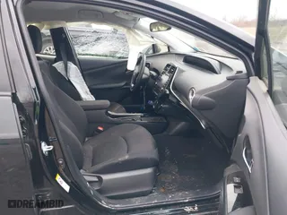 2021 Toyota Prius Prime LE with VIN JTDKAMFP2M3165859, listed as a IAAI auction lot 41943098 with 20,306 mi miles. Bid and sale history available at carsss.com. Image 5.