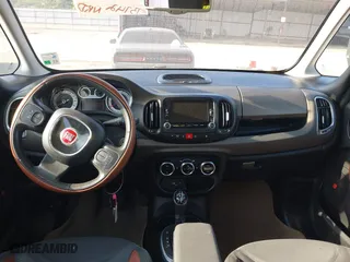 2014 FIAT 500L Trekking with VIN ZFBCFADH7EZ022679, listed as a IAAI auction lot 42053114 with 73,742 mi miles. Bid and sale history available at carsss.com. Image 13.