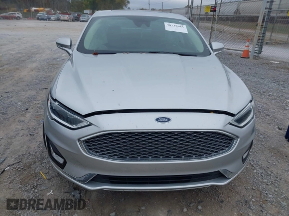 2019 Ford Fusion Titanium with VIN 3FA6P0K96KR120749, listed as a IAAI auction lot 40737085 with 118,376 mi miles and . Bid and sale history available at DreamBid. Image 12.