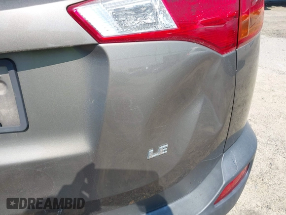 2014 Toyota RAV4 LE with VIN JTMZFREVXED034316, listed as a IAAI auction lot 42610135 with 214,871 mi miles and . Bid and sale history available at DreamBid. Image 6.