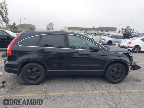 2011 Honda CR-V LX z VIN 5J6RE3H33BL021459, wystawiony jako IAAI lot #41186599 z przebiegiem 116 980 mil mil oraz . Historia ofert i sprzedaży dostępna na DreamBid. Obrazek 14.