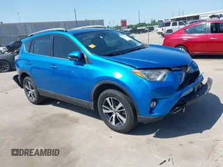 2018 Toyota RAV4 XLE with VIN JTMWFREV2JJ168557, listed as a IAAI auction lot 41994837 with 107,636 mi miles. Bid and sale history available at carsss.com. Image 1.