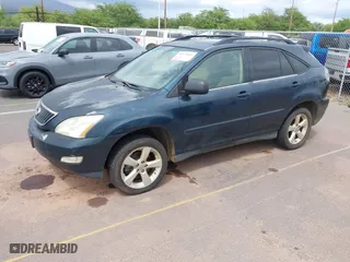 2005 Lexus RX 330 with VIN JTJGA31U050056409, listed as a IAAI auction lot 41828865 with 216,093 mi miles. Bid and sale history available at carsss.com. Image 2.