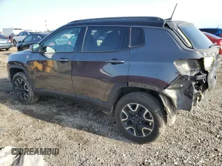2019 Jeep Compass Trailhawk with VIN 3C4NJDDB0KT739946, listed as a Copart auction lot 44887965 with 144,502 mi miles and Salvage Title. Bid and sale history available at carsss.com. Image 2.