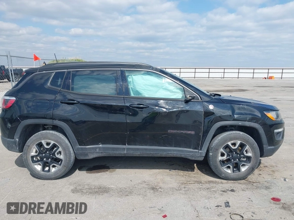 2017 Jeep Compass Trailhawk z VIN 3C4NJDDB6HT631047, wystawiony jako IAAI lot #42457508 z przebiegiem 59 414 mil mil oraz . Historia ofert i sprzedaży dostępna na DreamBid. Obrazek 13.