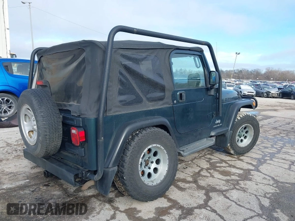 2005 Jeep Wrangler SE with VIN 1J4FA29S45P333916, listed as a IAAI auction lot 41214841 with 90,577 mi miles. Bid and sale history available at carsss.com. Image 4.