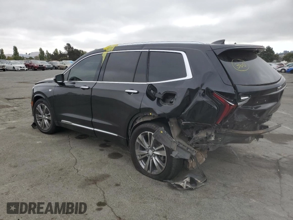 2022 Cadillac XT6 Premium Luxury with VIN 1GYKPDRS5NZ110989, listed as a Copart auction lot 69600894 with 56,148 mi miles and Salvage Title. Bid and sale history available at carsss.com. Image 2.