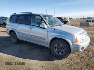 2004 Suzuki XL-7 LX with VIN JS3TX92V744101106, listed as a Copart auction lot 51679195 with 181,634 mi miles and Salvage Title. Bid and sale history available at carsss.com. Image 4.
