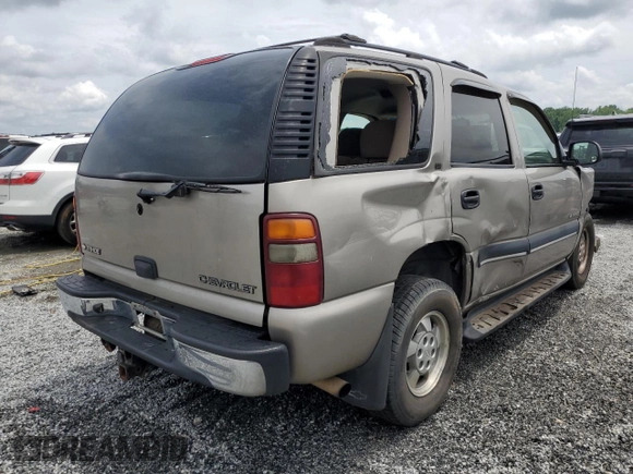 2002 Chevrolet Tahoe LS with VIN 1GNEC13Z52J232577, listed as a Copart auction lot 58770895 with 240,960 mi miles and Salvage title. Bid and sale history available at DreamBid. Image 3.
