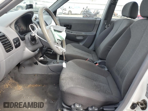 2003 Hyundai Accent GL with VIN KMHCG45C63U485420, listed as a Copart auction lot 48251265 with 139,179 mi miles and Salvage Title. Bid and sale history available at carsss.com. Image 7.