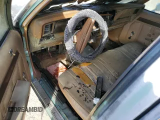 1977 Chevrolet Impala с VIN IL69U7J272968, выставлен на аукционе Copart как лот 75909154 с пробегом Не указан миль и Списание • Salvage title. История ставок и продаж доступна на DreamBid. Изображение 8.