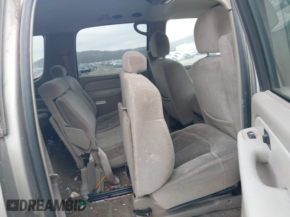 2002 Chevrolet Suburban LS z VIN 1GNEC16Z82J252026, wystawiony jako IAAI lot #41200765 z przebiegiem 287 164 mil mil oraz . Historia ofert i sprzedaży dostępna na DreamBid. Obrazek 8.