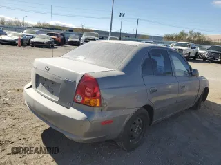 2003 Hyundai Accent GL with VIN KMHCG45C13U455449, listed as a Copart auction lot 42625285 with 0 mi miles and Salvage Title. Bid and sale history available at carsss.com. Image 3.