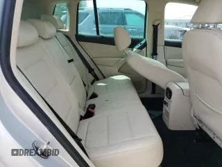 2011 Volkswagen Tiguan SEL z VIN WVGBV7AX6BW559854, wystawiony jako Copart lot #56268195 z przebiegiem 107 428 mil mil oraz Czysty tytuł • Clean title. Historia ofert i sprzedaży dostępna na DreamBid. Obrazek 11.
