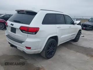 2018 Jeep Grand Cherokee Laredo E with VIN 1C4RJEAG0JC218694, listed as a IAAI auction lot 41587665 with 97,618 mi miles. Bid and sale history available at carsss.com. Image 4.