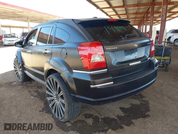 2010 Dodge Caliber SXT z VIN 1B3CB4HA3AD612829, wystawiony jako IAAI lot #42303635 z przebiegiem 230 191 mil mil oraz . Historia ofert i sprzedaży dostępna na DreamBid. Obrazek 3.