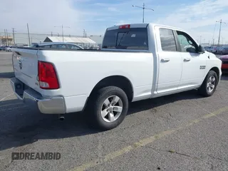 2015 Ram 1500 Big Horn with VIN 1C6RR6GGXFS675250, listed as a IAAI auction lot 41812268 with 200,861 mi miles and . Bid and sale history available at DreamBid. Image 4.