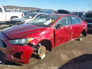 2019 Ford Fusion Hybrid SE with VIN 3FA6P0LU5KR189838, listed as a IAAI auction lot 41407401 with 134,834 mi miles. Bid and sale history available at carsss.com. Image 2.