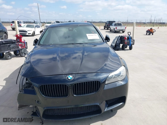2013 BMW M5 with VIN WBSFV9C54DD095547, listed as a IAAI auction lot 41601733 with 1 mi miles. Bid and sale history available at carsss.com. Image 12.