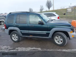 2005 Jeep Liberty Sport with VIN 1J4GL48K15W631101, listed as a IAAI auction lot 41217588 with 168,378 mi miles. Bid and sale history available at carsss.com. Image 13.