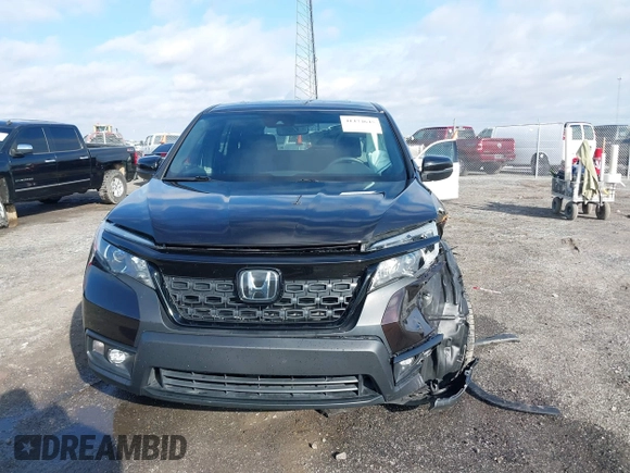 2021 Honda Passport EX-L with VIN 5FNYF7H56MB009450, listed as a IAAI auction lot 41474645 with 91,140 mi miles. Bid and sale history available at carsss.com. Image 12.