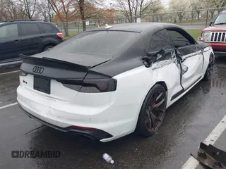 2018 Audi RS 5 z VIN WUAPWAF5XJA905043, wystawiony jako IAAI lot #41978868 z przebiegiem 60 838 mil mil oraz . Historia ofert i sprzedaży dostępna na DreamBid. Obrazek 4.