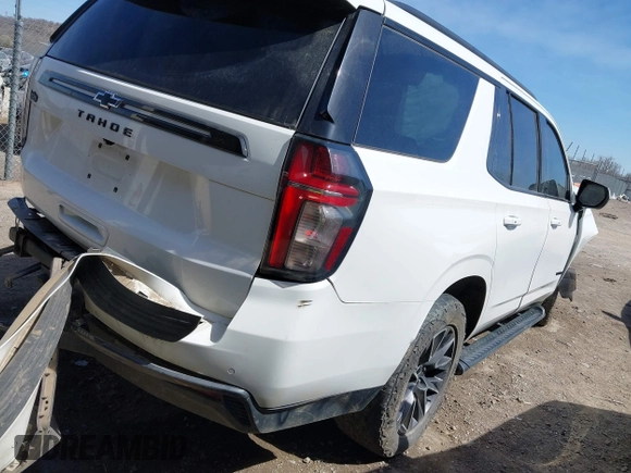 2021 Chevrolet Tahoe Z71 with VIN 1GNSKPKD7MR117286, listed as a IAAI auction lot 41778088 with 87,938 mi miles and . Bid and sale history available at DreamBid. Image 4.