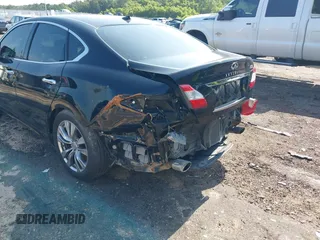 2012 Infiniti M Hybrid with VIN JN1EY1AP8CM910933, listed as a IAAI auction lot 42682477 with 157,048 mi miles and . Bid and sale history available at DreamBid. Image 12.