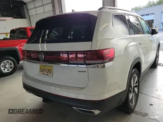 2024 Volkswagen Atlas SE with VIN 1V2HR2CA2RC556331, listed as a IAAI auction lot 42806429 with 25,239 mi miles and . Bid and sale history available at DreamBid. Image 5.